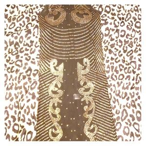 A Black and gold sequins dress